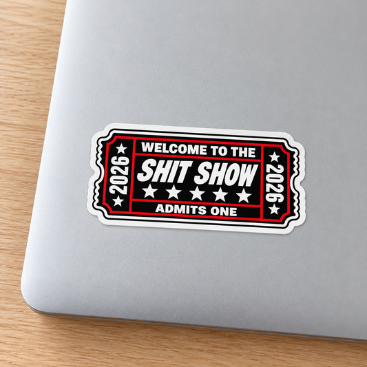 2026 Welcome to the Shit Show ticket sticker on a silver laptop; mockup for display