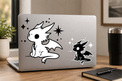 Cute dragon vinyl decal displayed on a laptop